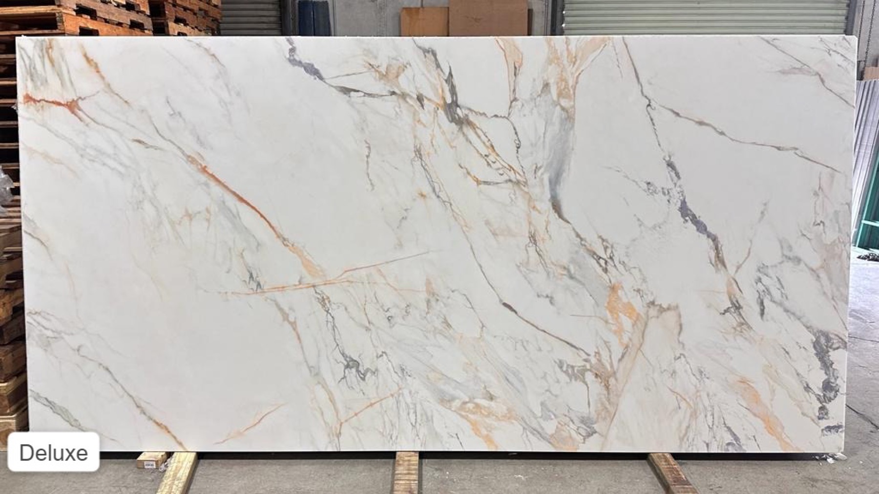 White marble-look slab with gold veining