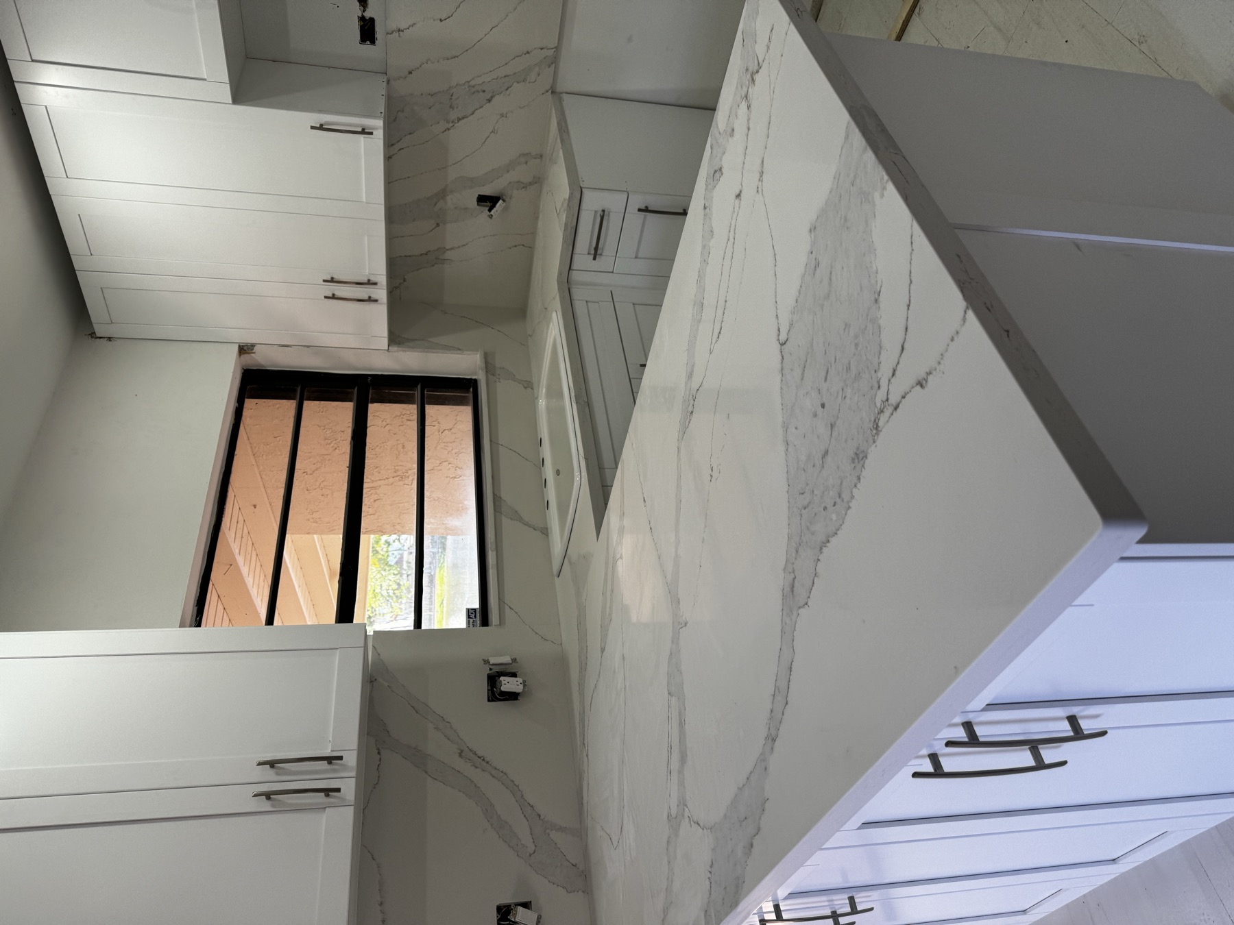 Bright white kitchen countertop installation
