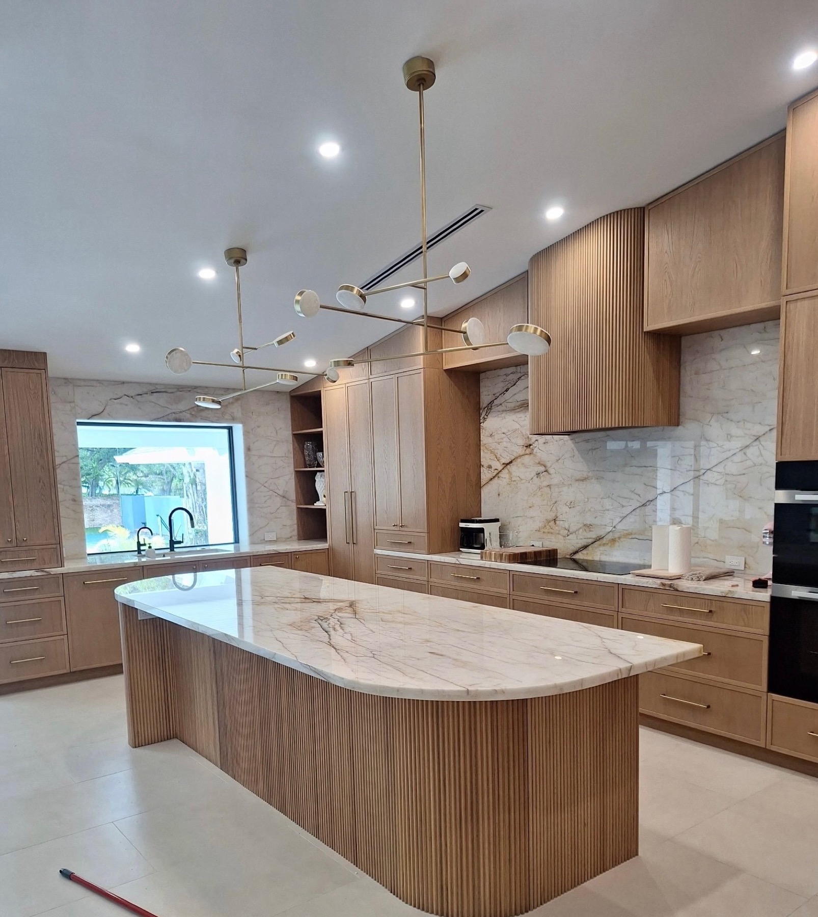Finished Osby Granite kitchen island with premium stone countertops